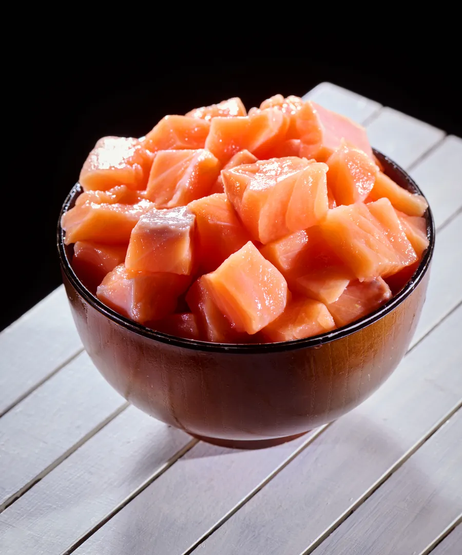 A bowl of salmon cut into cubes this morning